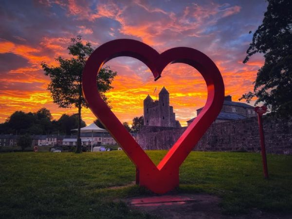 Sunset at the castle by Tom Gilroy